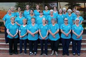 A group of 25 women who were members of the Fremantle Hospital Ladies Auxiliary in 2025 when the auxiliary celebrated its centenary.